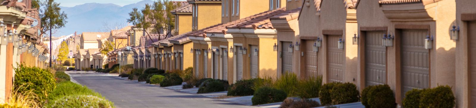 A view at a suburban street with garages in a row